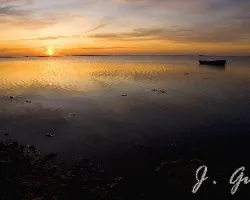 Puesta de sol junto al Mar